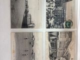 une vieille photo représentant un livre ouvert avec des images d'une ville