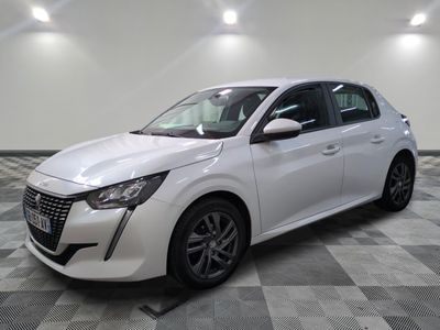 the white car is parked on a checkered floor in the garage