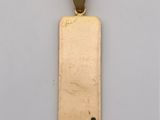 a gold plated pendant with a rectangle shaped rectangle in the center