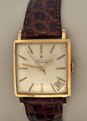 an image of a watch on display on a table