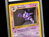 a close up of a pokemon card on a black background