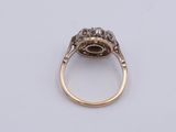 an old cut diamond ring set in 18k yellow gold
