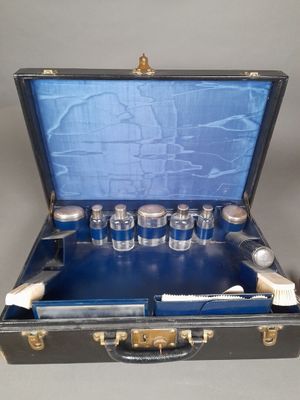 a suitcase with a lot of items inside of it