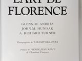 a white book with black writing on the cover