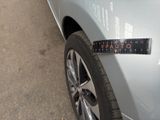 a close up of a sticker on the side of a car