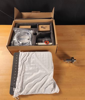 a box that has some items in it on a table