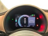 the dashboard of a car with a digital display on it