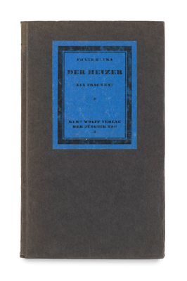 un livre marron avec une couverture bleue