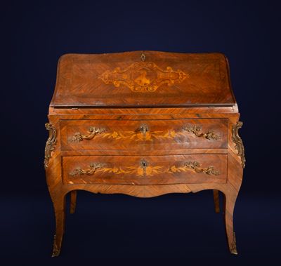 an old wooden desk with a drawer on top of it