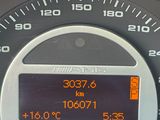 a close up of a speedometer on a car ' s dashboard