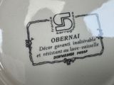 a white plate with a black and white label on it
