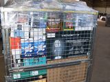 a metal cart with many items in it in a warehouse
