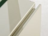 a close up of a glass table with a mirror on it