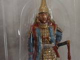 toy figurine of a man in armor in a clear box