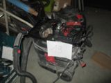 an image of a car engine with a sign attached to it