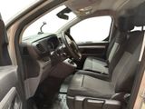 a view of the inside of a truck with the driver ' s seat up
