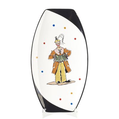 un gros plan d'une planche de surf sur laquelle est représenté un clown