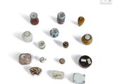 a lot of small objects that are on a white surface