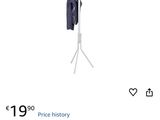 an image of a picture of a clothes rack on a shelf