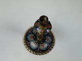 a small candle that is sitting on top of a table