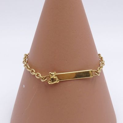 bracelet plaqué or composé d'une barre suspendue à une chaîne fixée à un cône