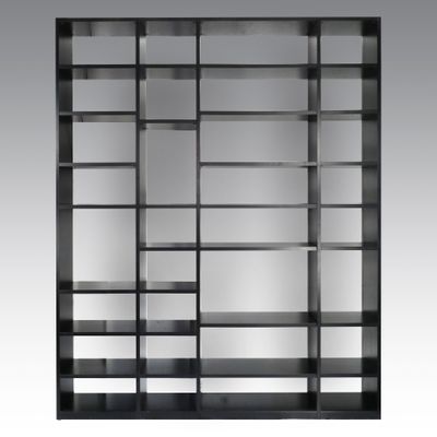 an image of a black bookcase with glass shelves