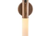 a close up of a light on a wall mounted light fixture