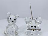 pair of clear crystal mouse figurines with black eyes