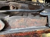 a close up of a metal object with some rust on it