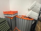 a room with a bunch of crates and crates on the floor