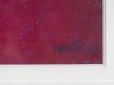 une photo d'une photo représentant un mur rouge sur lequel sont écrits des mots