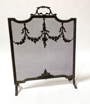 an image of a fireplace screen with a decorative design on it