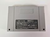 a close up of a nintendo game on a white surface