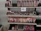 a lot of makeup products on the shelves in the store
