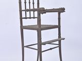 chair made of wood and iron with a seat made of wood and iron