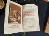 an open book with a picture of a man sitting at a desk