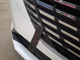 a close up of a car with a tag on it
