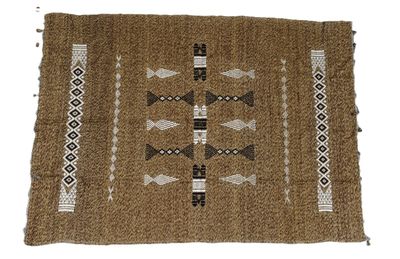 a brown rug with arrows and arrows on it