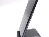 a cell phone that is sitting on a stand