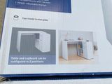 a box that has a picture of a desk in it