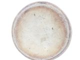 a close up of a plate with writing on it