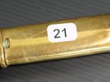 a close up picture of a gold and black umbrella