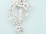 a brooch with a bunch of diamonds on it