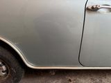 a close up of a car door handle on the side of the car