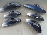 six black and chrome car side mirrors on a table