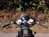 a motorcycle that is parked on the side of the road