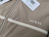 a close up of a jacket with a name tag on it