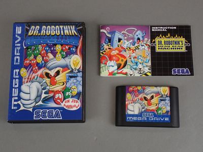 three nintendo games are sitting on a table next to each other