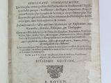 an open book with a black and white image of a man ' s face on it