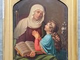 une image représentant un tableau où l'on voit une femme lisant un livre à un enfant